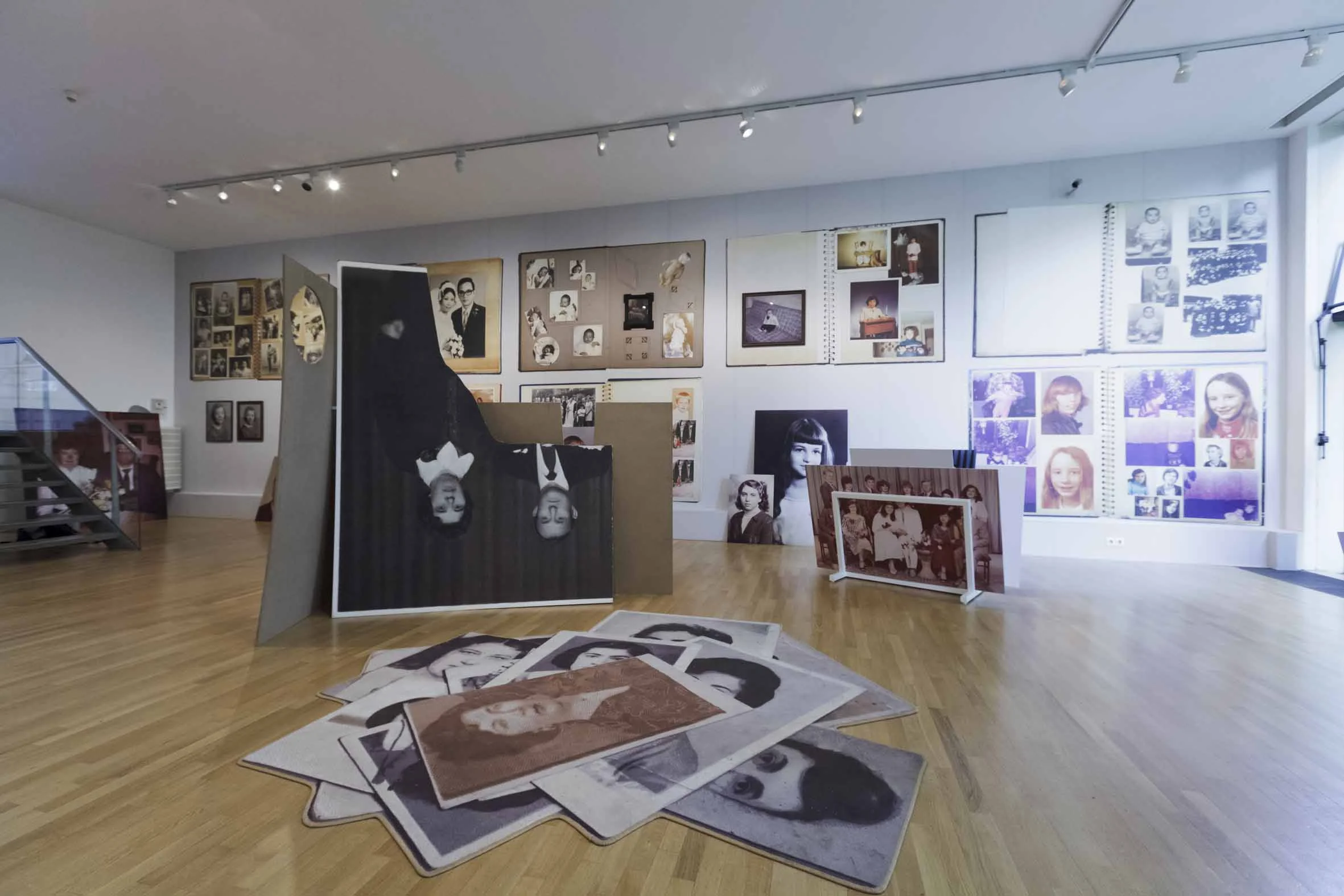 Album Beauty installation by Erik Kessels, created from family photo albums.